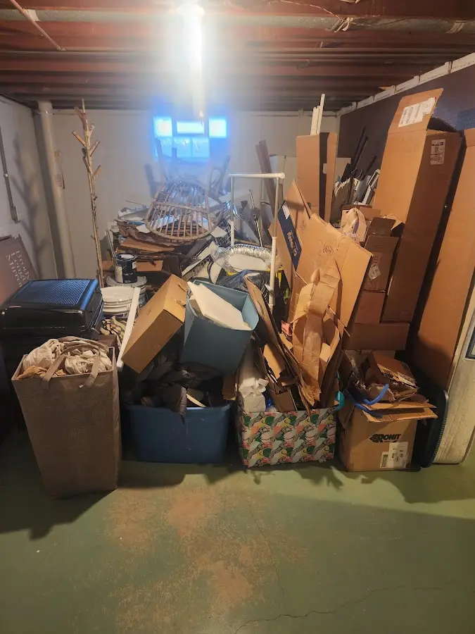 Roll-off dumpster container at job site for 20 Yard Dumpster Rental in Sabattus